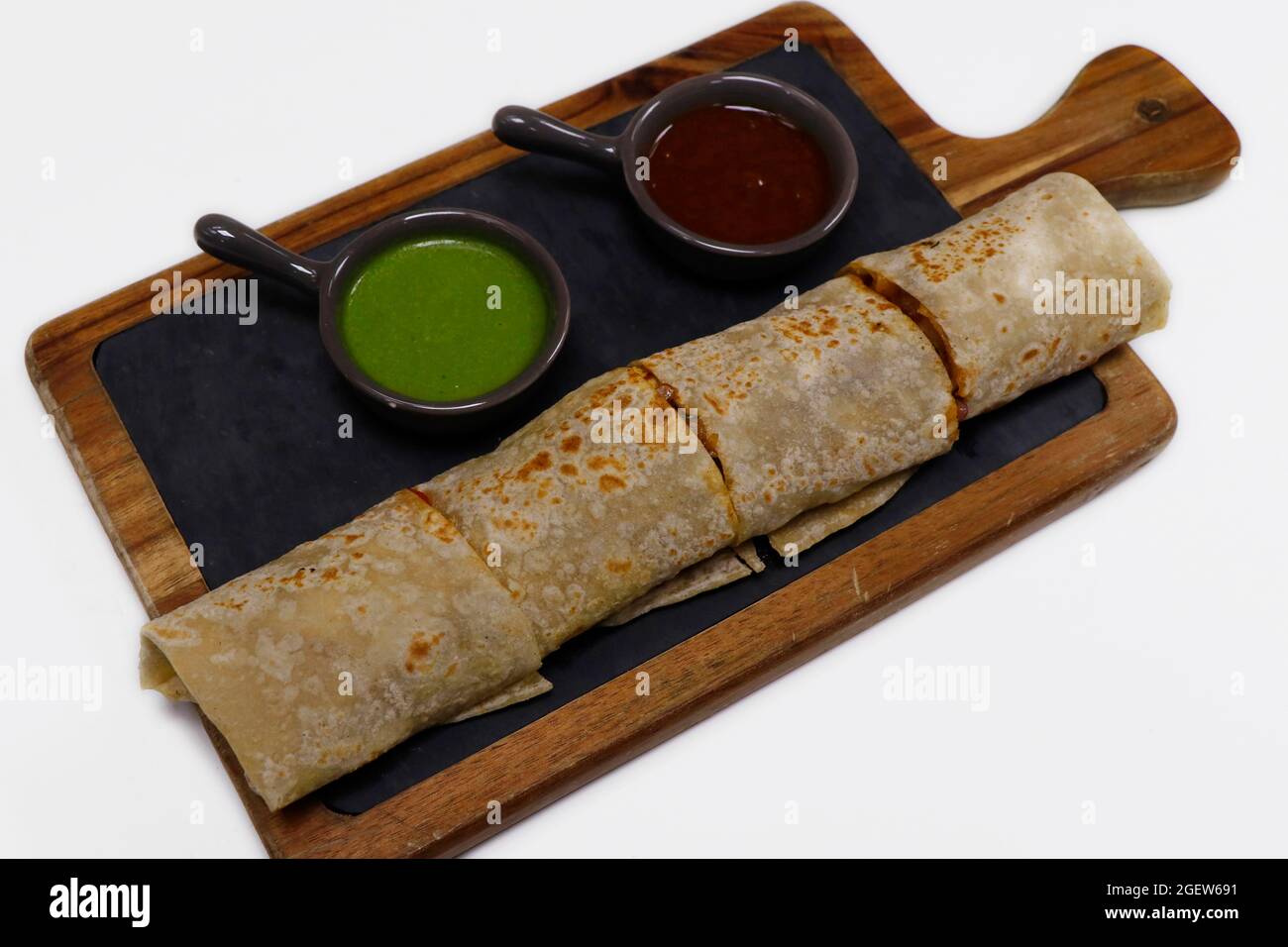 chicken tikka wrap sandwich served with mint and tamarind chutney