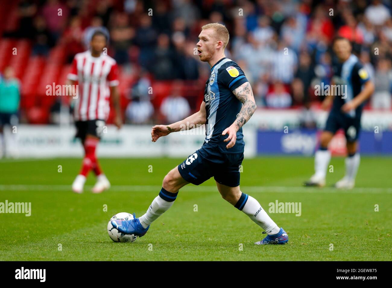 Sheffield, UK. 21st Aug, 2021. Lewis O'Brien #8 of Huddersfield Town in Sheffield, United Kingdom on 8/21/2021. (Photo by Ben Early/News Images/Sipa USA) Credit: Sipa USA/Alamy Live News Stock Photo