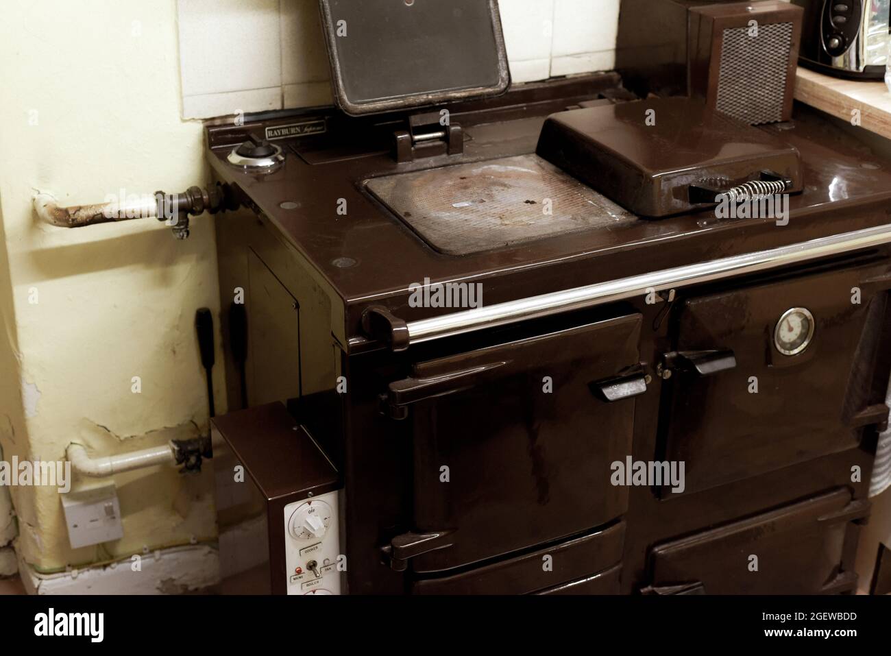 Old style oil burning stove in retro kitchen interior Stock Photo Alamy
