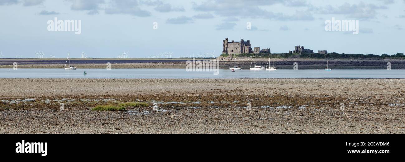 Piel Castle viewed from Roa Island is a medieval castle on Piel Island at the tip of the Furness Peninsula near Barrow-in-Furness Stock Photo
