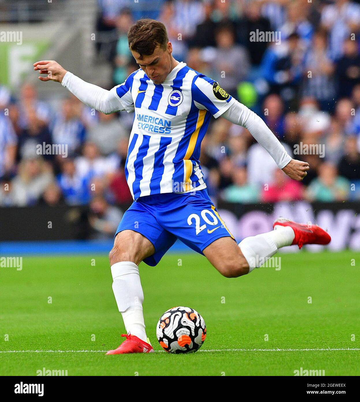 Brighton, UK. 21st Aug, 2021. Solly March of Brighton and Hove Albion makes a cross field pass during the Premier League match between Brighton & Hove Albion and Watford at The Amex on August 21st 2021 in Brighton, England. (Photo by Jeff Mood/phcimages.com) Credit: PHC Images/Alamy Live News Stock Photo