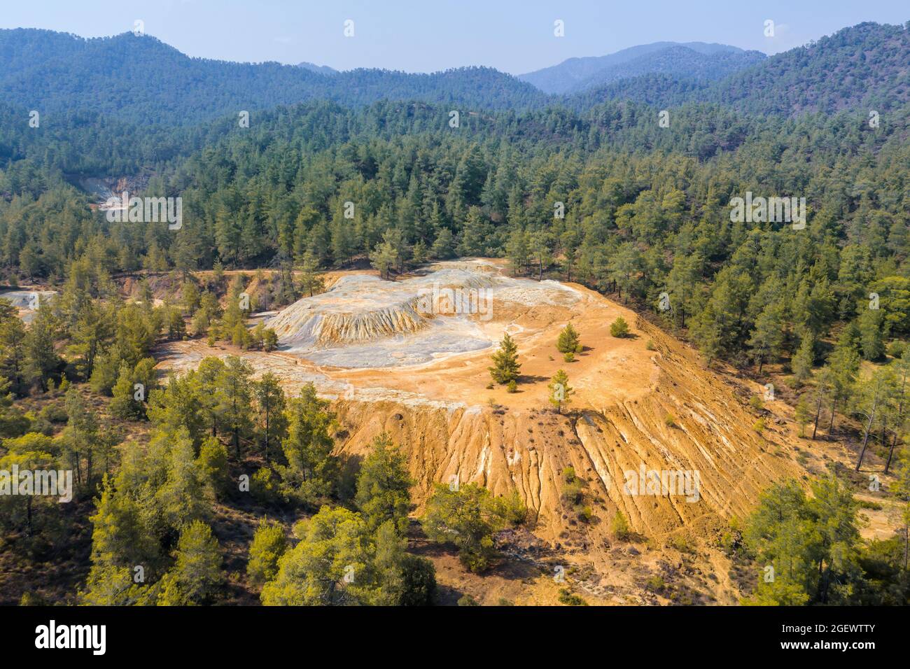 Colorful mine tailings from pyrite ore extraction in Troodos mountains, Cyprus. Aerial panorama Stock Photo