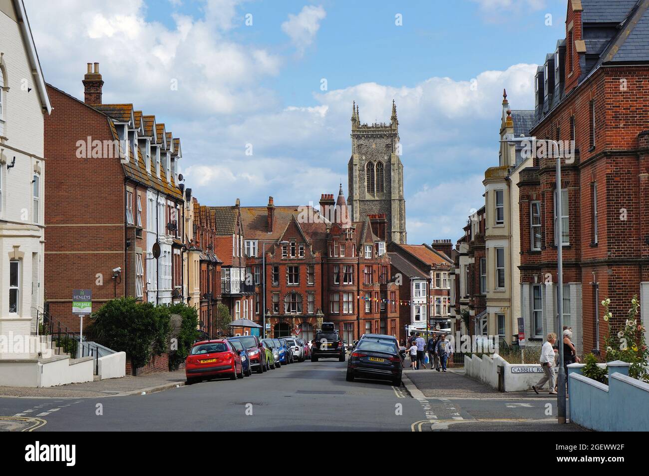 A street scene in Cromer with St. Peter and Paul's church tower in the distance. Stock Photo