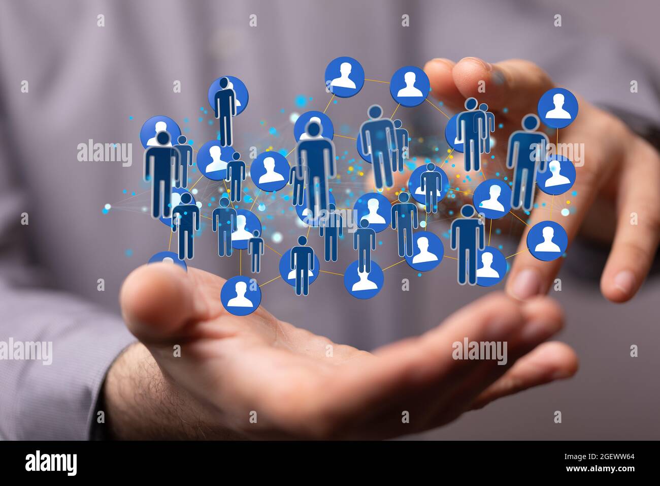 3D rendered people silhouettes held in a person's hand Stock Photo - Alamy