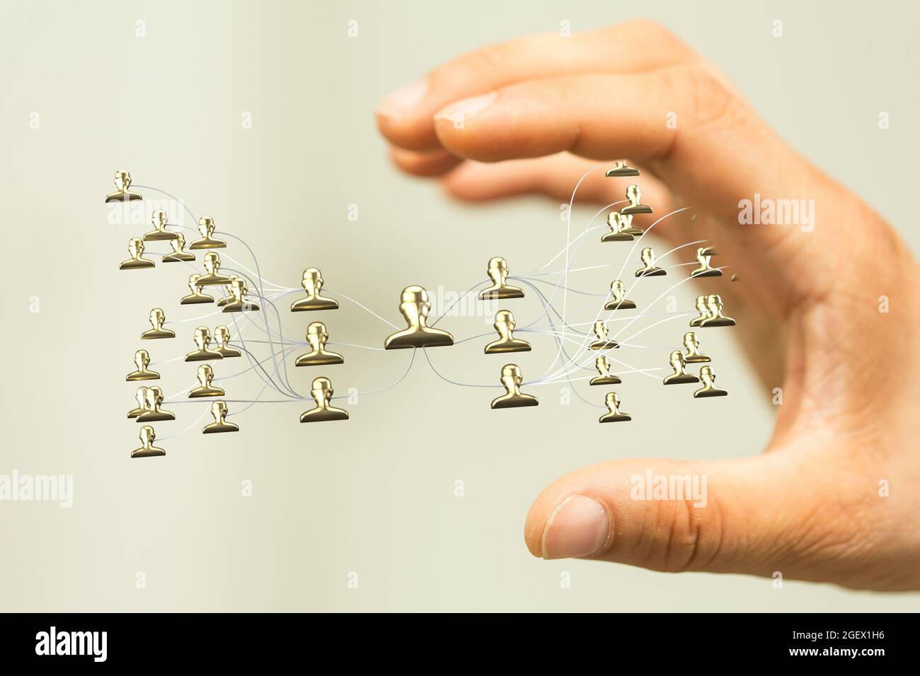 3D rendered people silhouettes held in a person's hand Stock Photo - Alamy