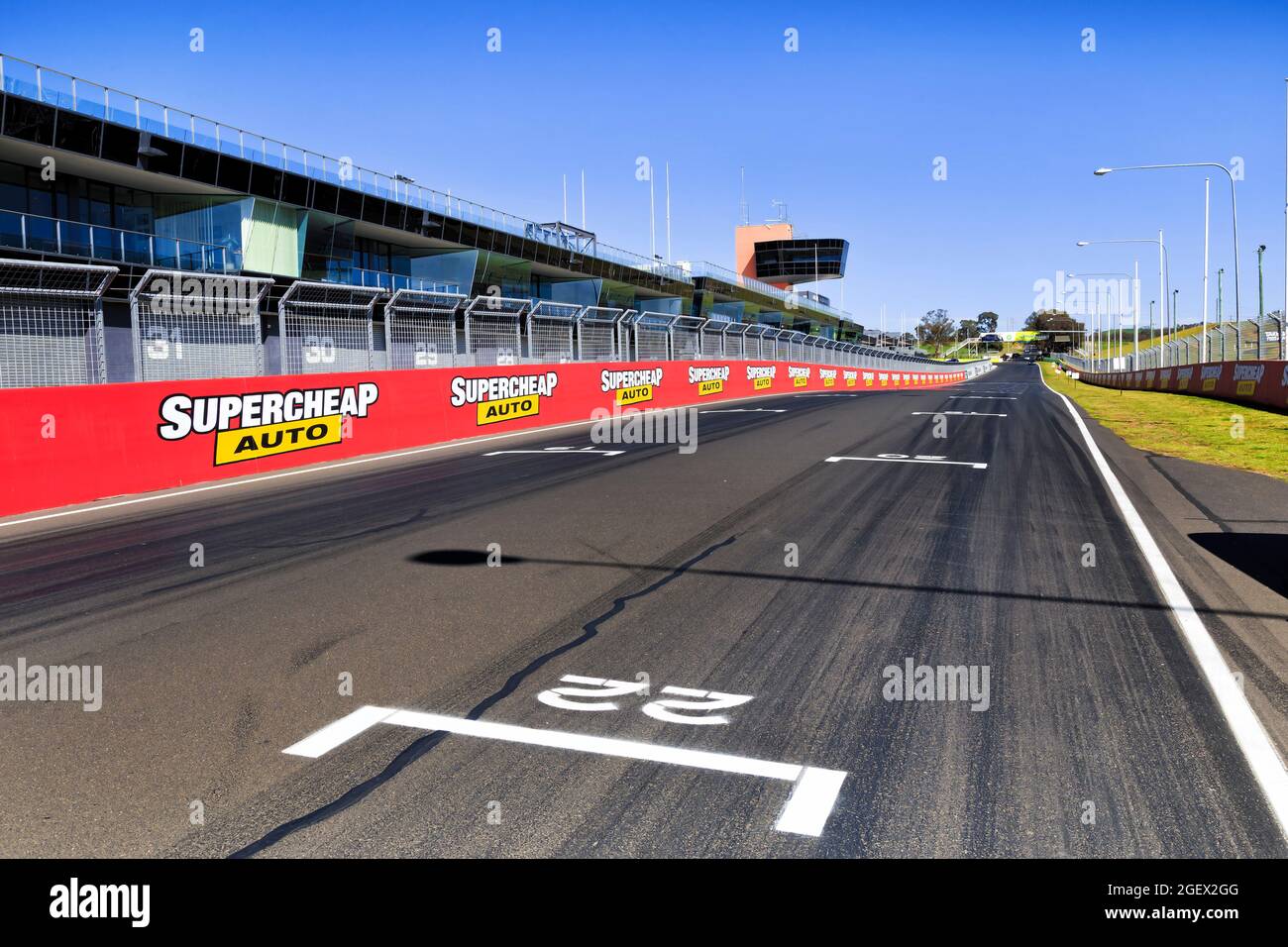 Bathurst, Australia - 4 October 2020: Start line and pit stop boxes under tribunes of Bathurst 1000 motor racing circuit on Mount Panorama. Stock Photo