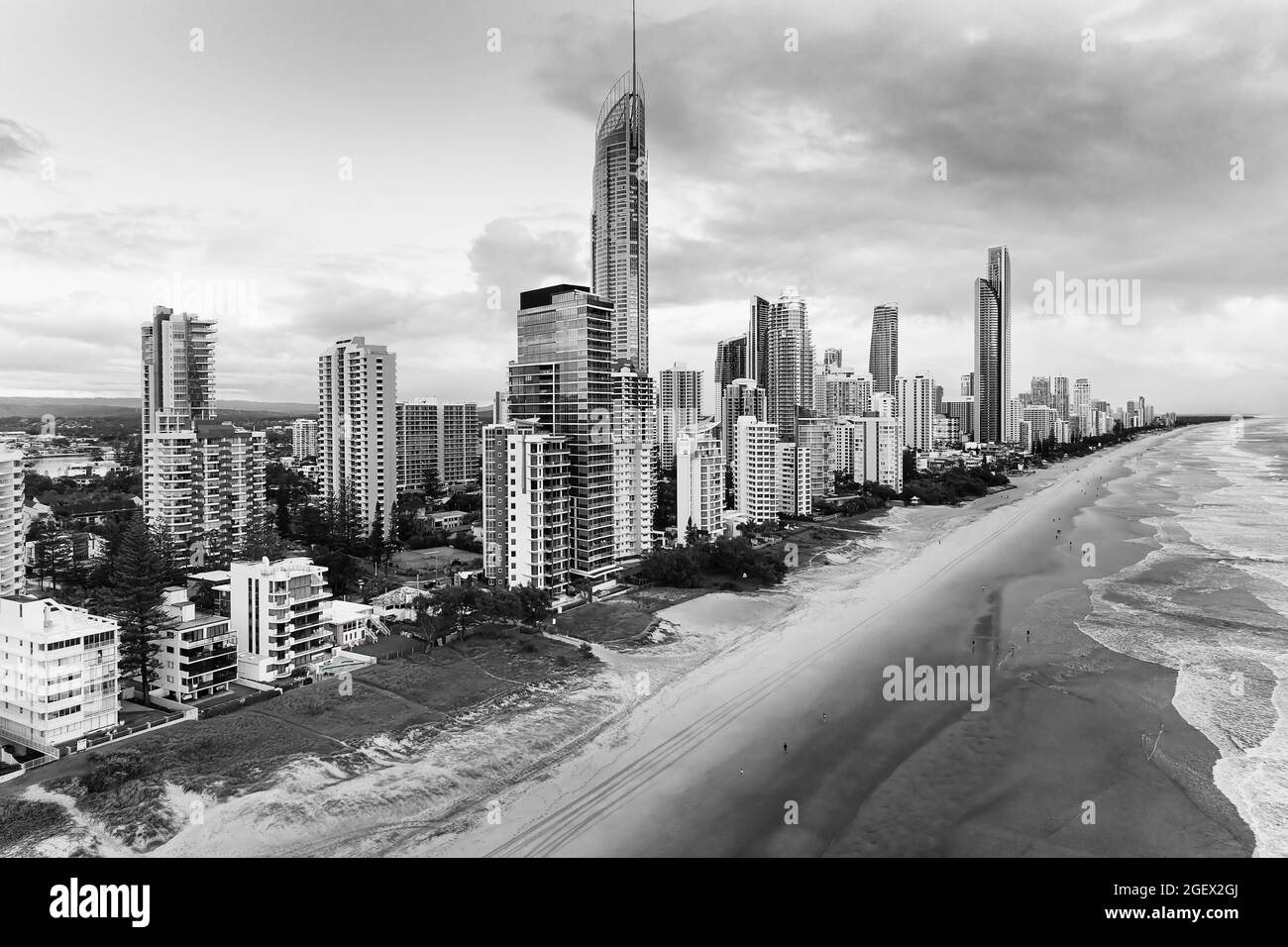 Moody cloudy cityscape of High-rise modern urban towers on waterfront of Surfers Paradise Pacific coast - Australian Gold Coast. Stock Photo