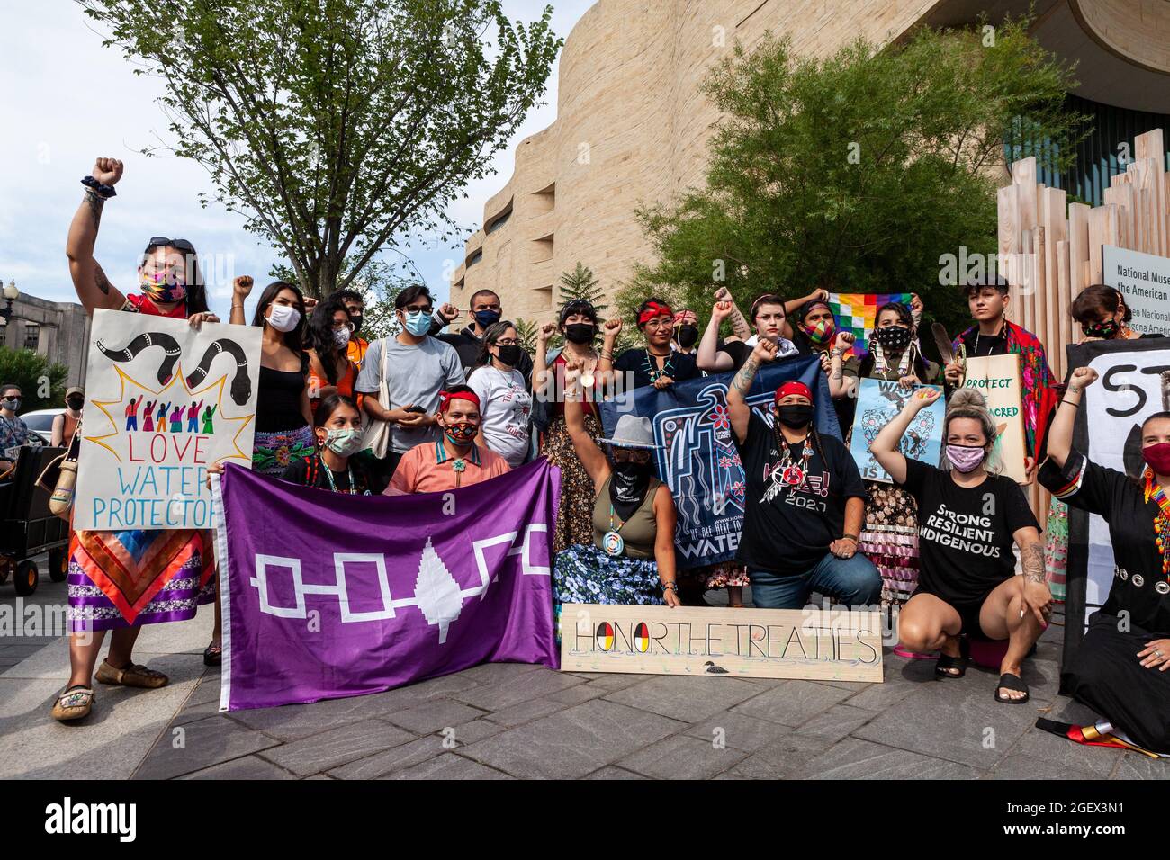 Washington, DC, USA, 21 August, 2021.  Pictured: Native American protesters host a ceremonial gathering at the National Museum of the American Indian (a Smithsonian musuem) to protest Enbridge's Line 3 tar sands oil pipeline.  The pipeline passes through treaty lands and the headwaters of the Mississippi River, to carry tar sands oil from Canada.  Credit: Allison Bailey / Alamy Live News Stock Photo