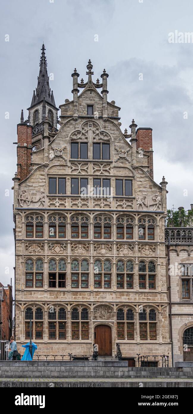 Gent, Flanders, Belgium - July 30, 2021: Closeup of Huis van de Vrije Schippers (House of the free shippers) on Graslei along Leie river. Sculpted bei Stock Photo