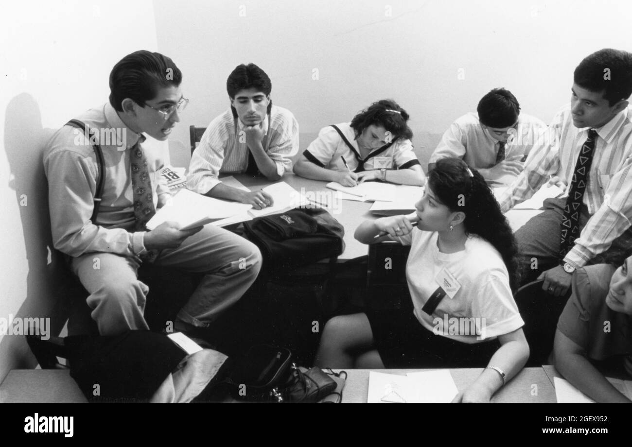 Austin Texas USA, circa 1990: High school teens attending Hispanic Youth Legislature civic engagement program at the Texas Capitol discuss bills before a committee. ©Bob Daemmrich Stock Photo