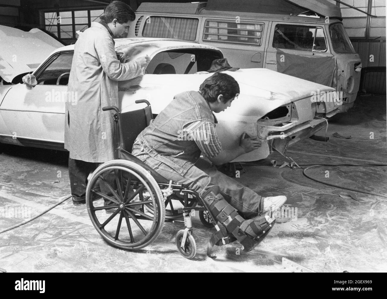 Austin Texas USA, 1990 Hispanic teen brothers, one in a wheelchair