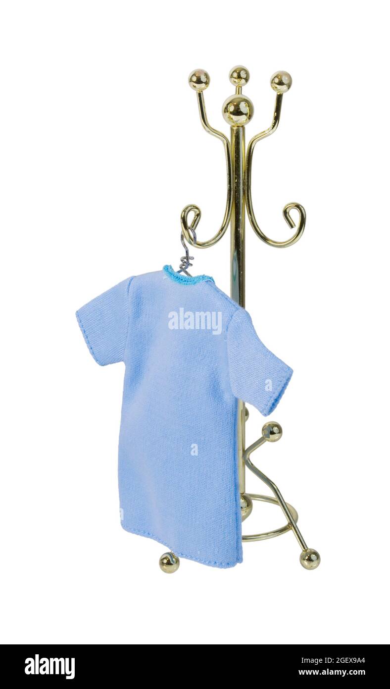 Blue shirt hanging off of coat rack - path included Stock Photo