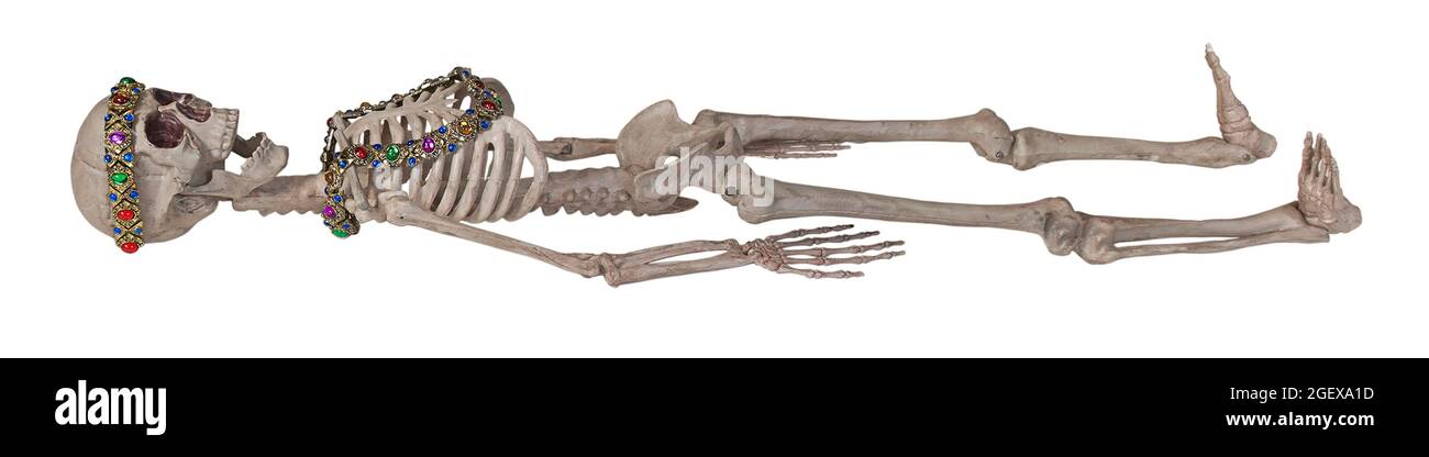 Skeleton wearing Antique gems arranged into jewelry - path included Stock Photo