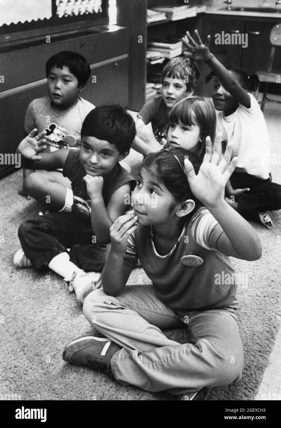 Austin, Texas USA, circa1991: Hispanic first grade students learning English as a Second Language at Sanchez Elementary School. ©Bob Daemmrich Stock Photo