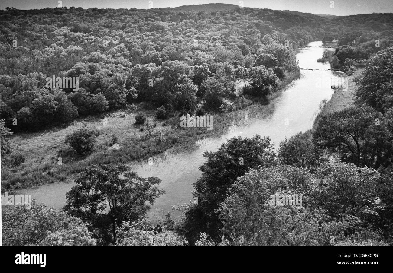 Austin, Texas USA, circa 1986: Barton Creek flowing through undeveloped, forested area on the west side of Austin. ©Bob Daemmrich Stock Photo