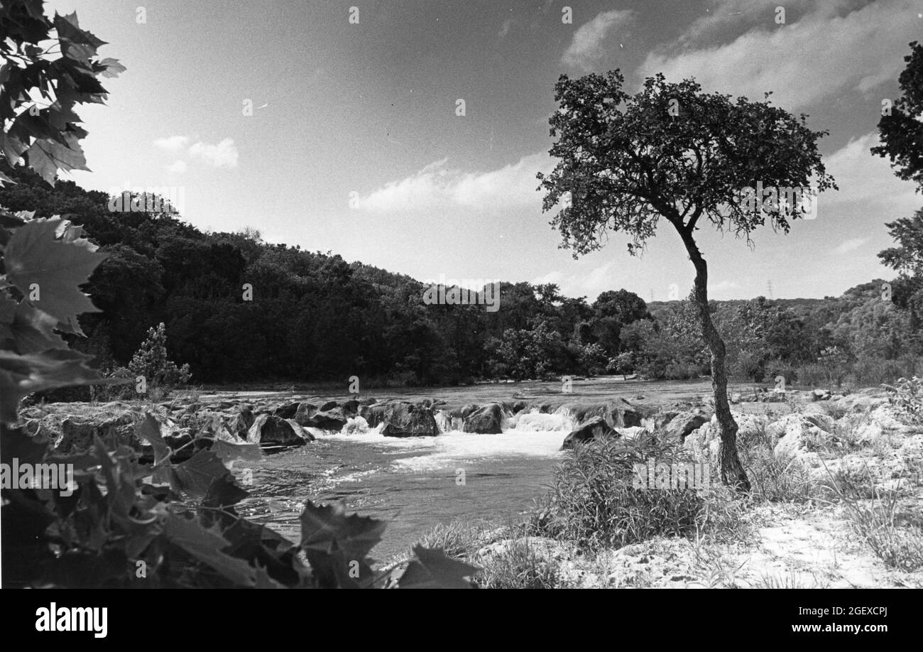 Blanco County Texas USA,1986: Pedernales River flowing through Pedernales Falls State Park in a rural part of central Texas near Austin. ©Bob Daemmrich Stock Photo