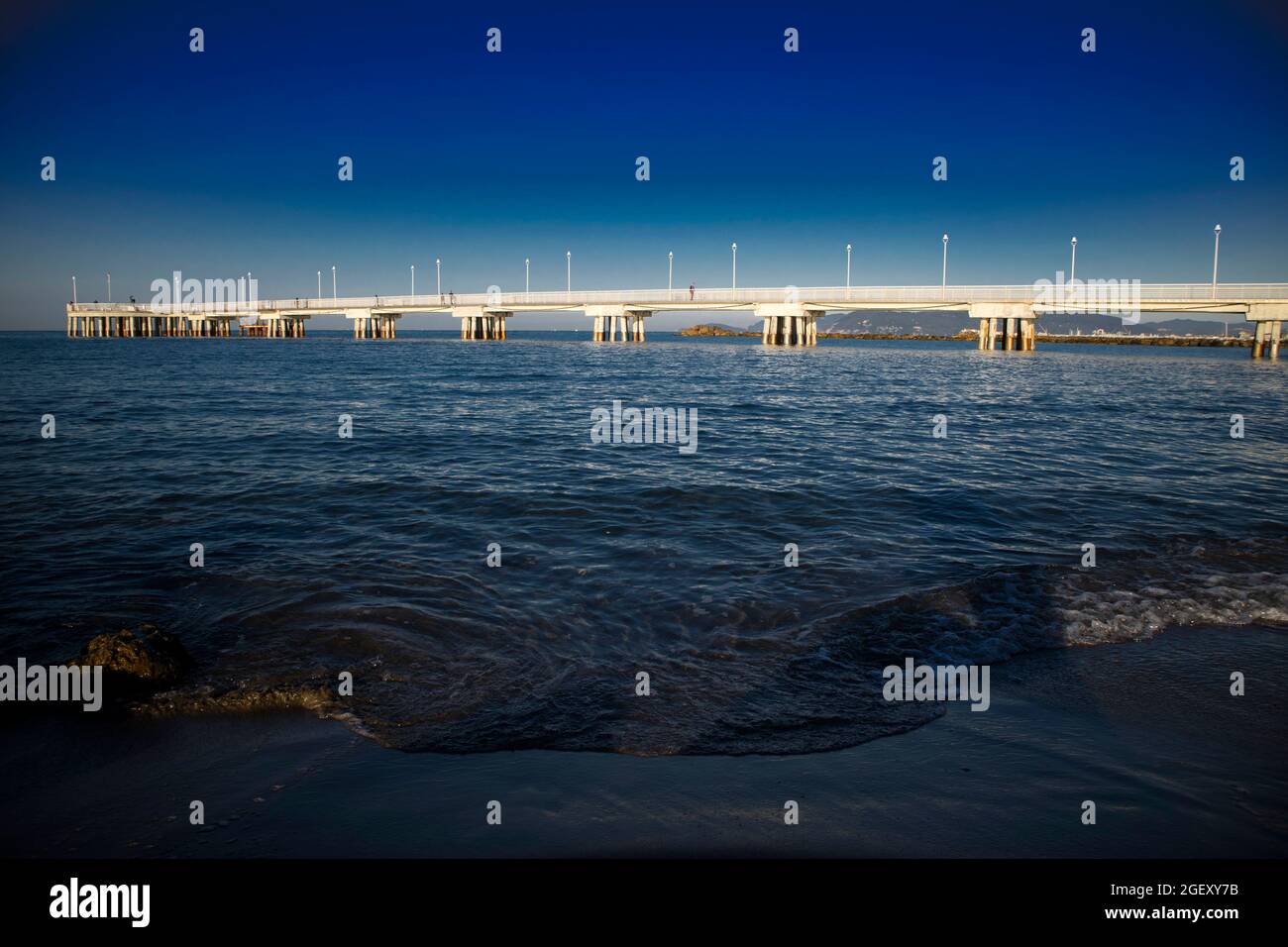 View of the white pier of Marina di Massa Tuscany Italy Stock Photo