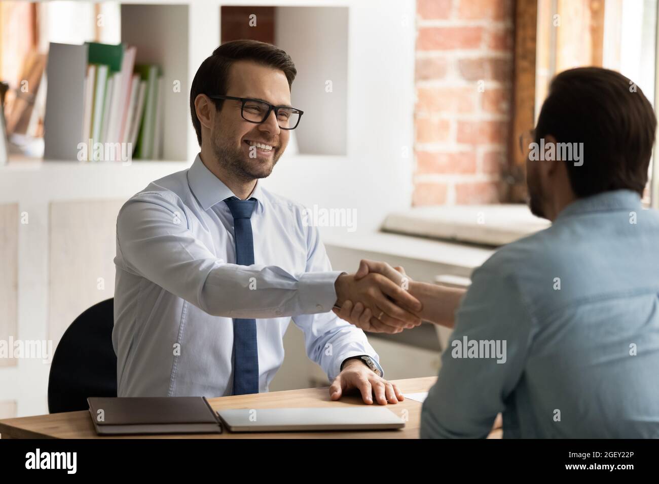 HR manager start job interview handshakes company position candidate Stock Photo