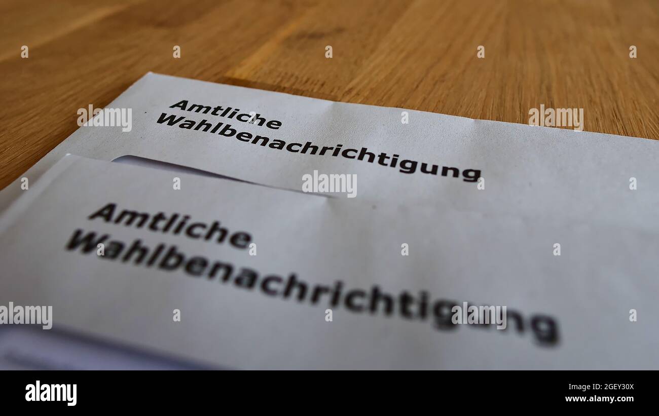 Two letters with the official polling cards (in German on envelope: 'amtliche Wahlbenachrichtigung') for the parliamentary elections in 2021. Stock Photo