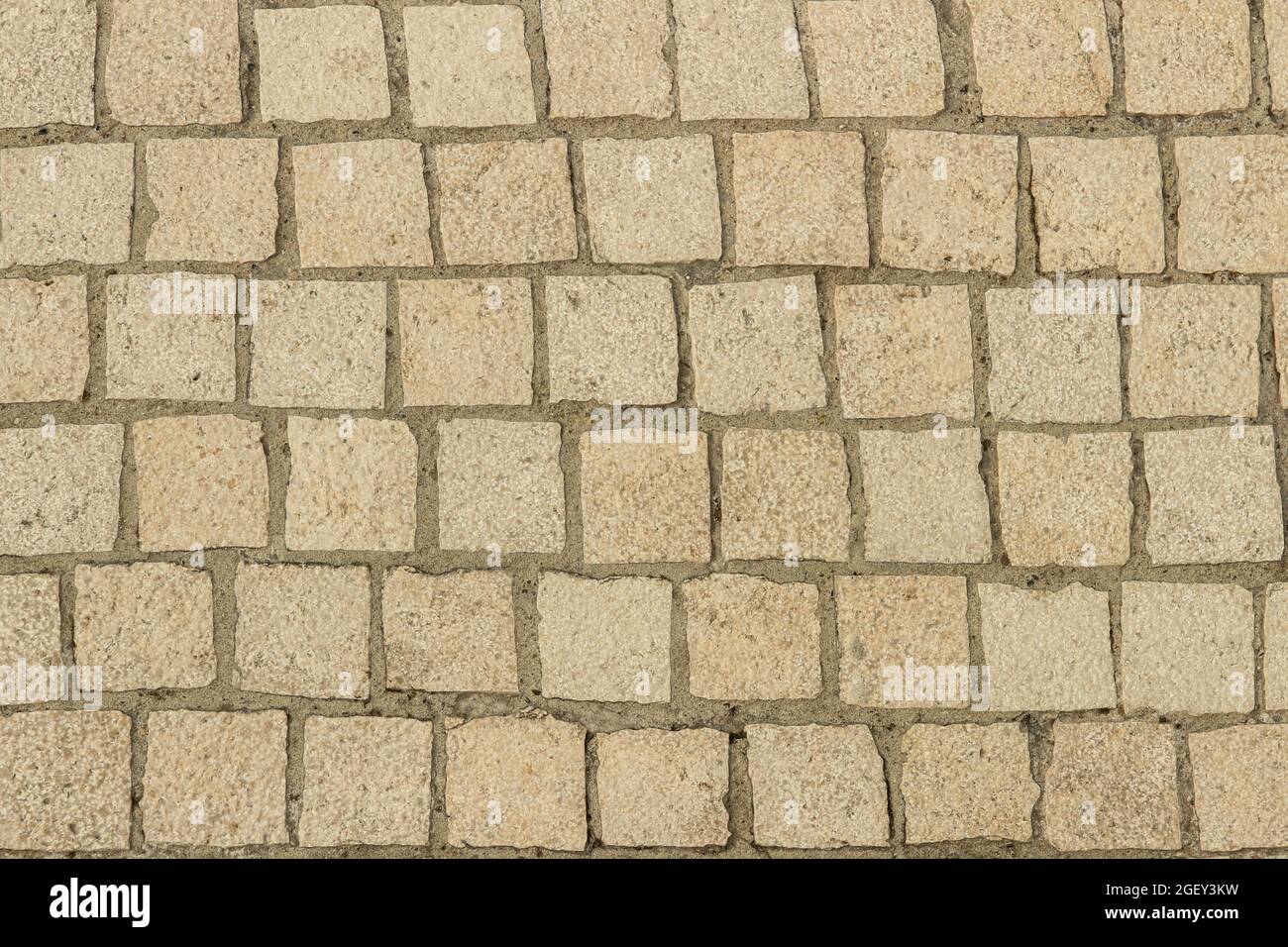 Paving stones close-up as a background. View from above Stock Photo