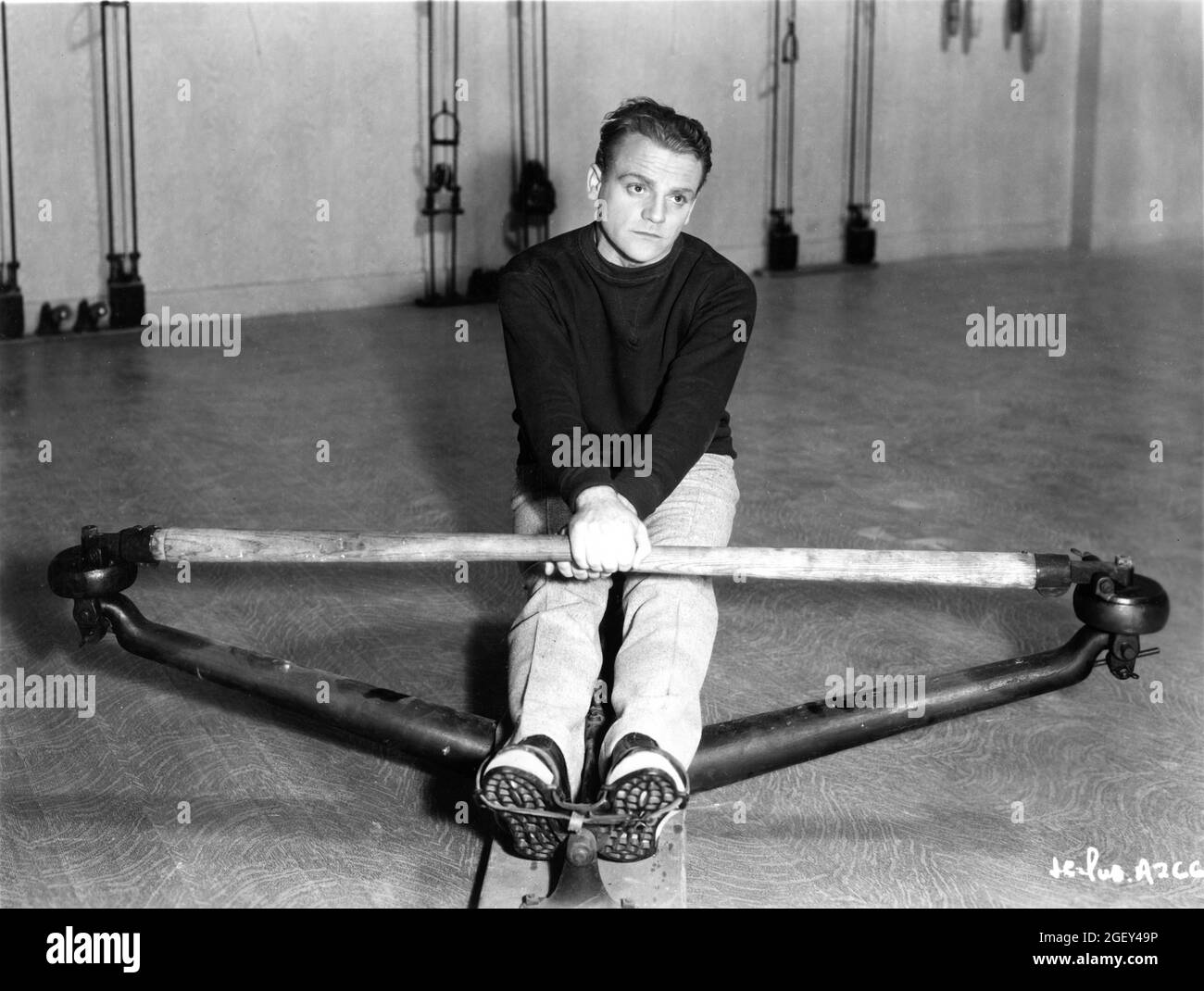 JAMES CAGNEY circa 1935 exercising on Rowing Machine publicity for Warner Bros. Stock Photo