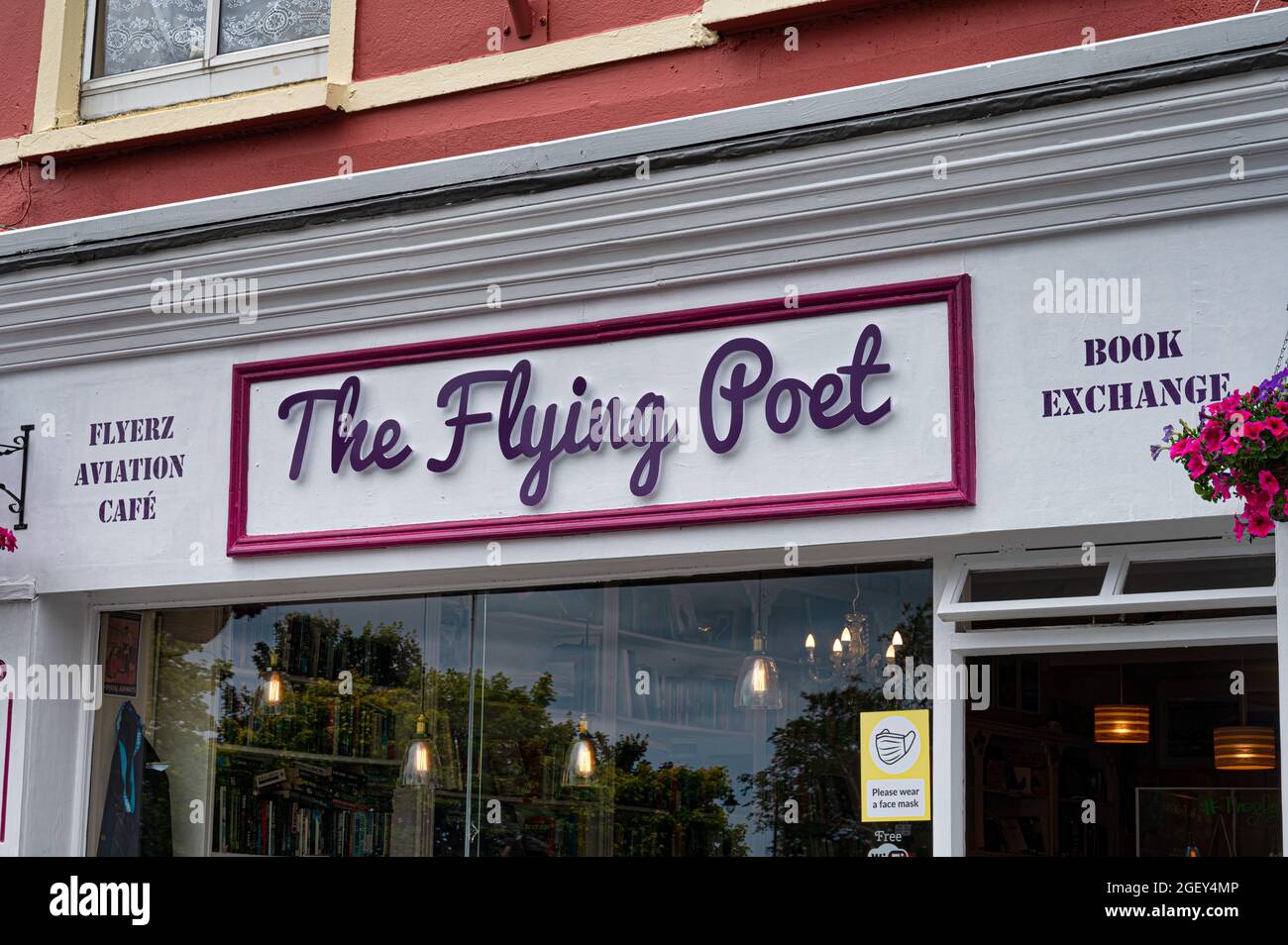 Kinsale, Ireland- July 13, 2021: The sign for The Flying Poet shop in Kinsale Stock Photo