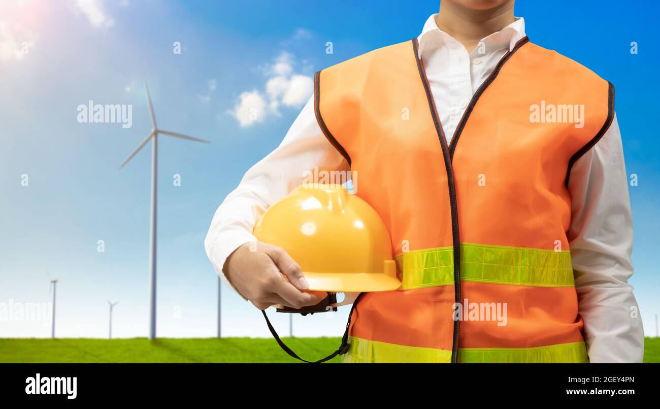 Green energy concept with engineer and 3d rendering wind mill farm ...