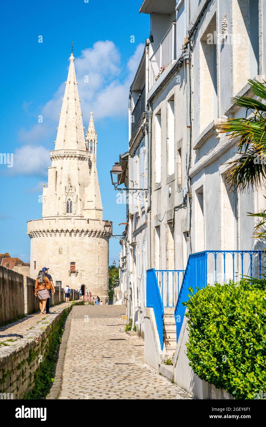 Vertical view of the Lantern Tower and Sur-Les-Murs medieval street in La Rochelle historic center France Stock Photo