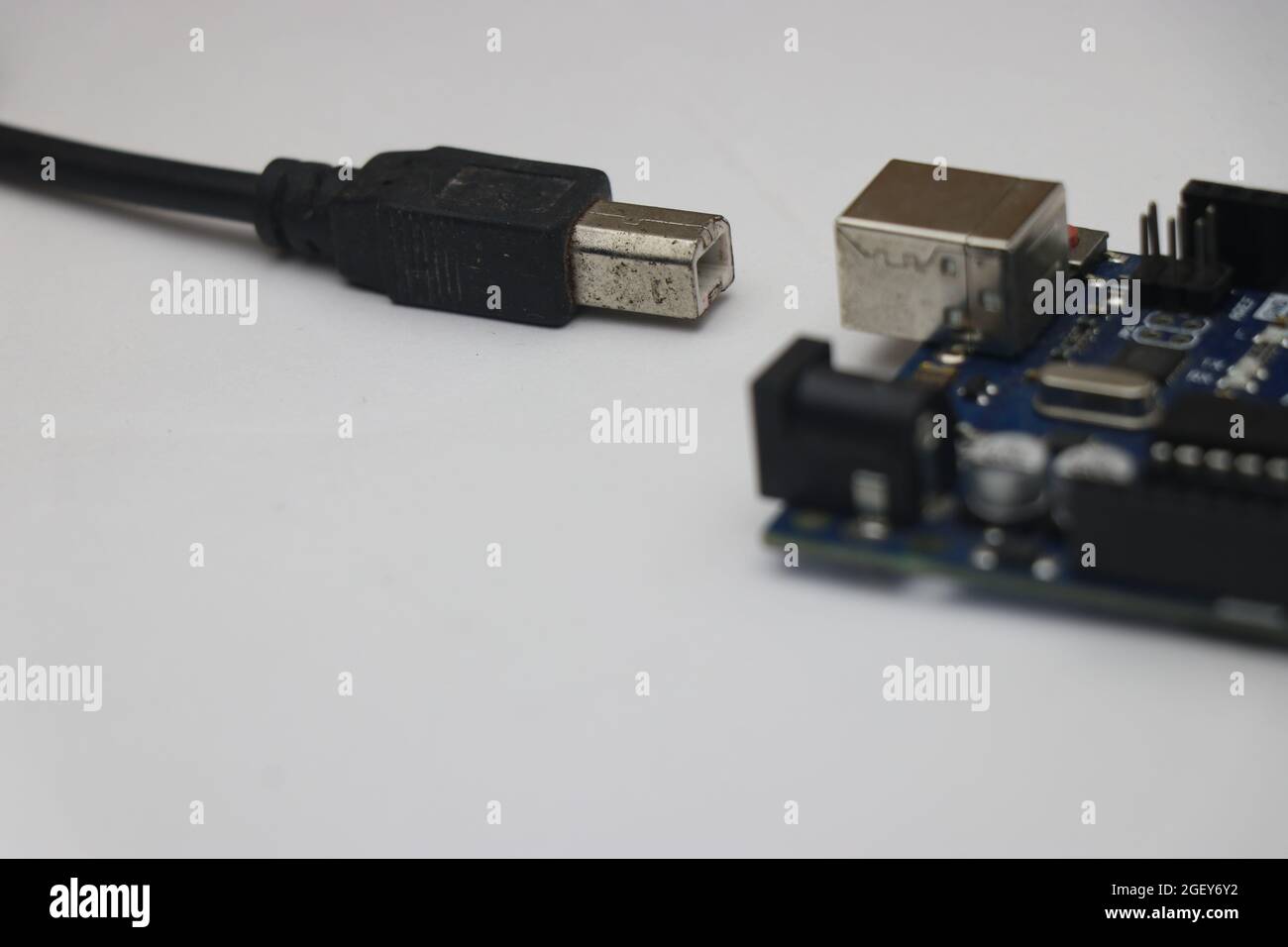 Microcontroller with programming cable disconnected. Programmable control board to make electronic projects Stock Photo