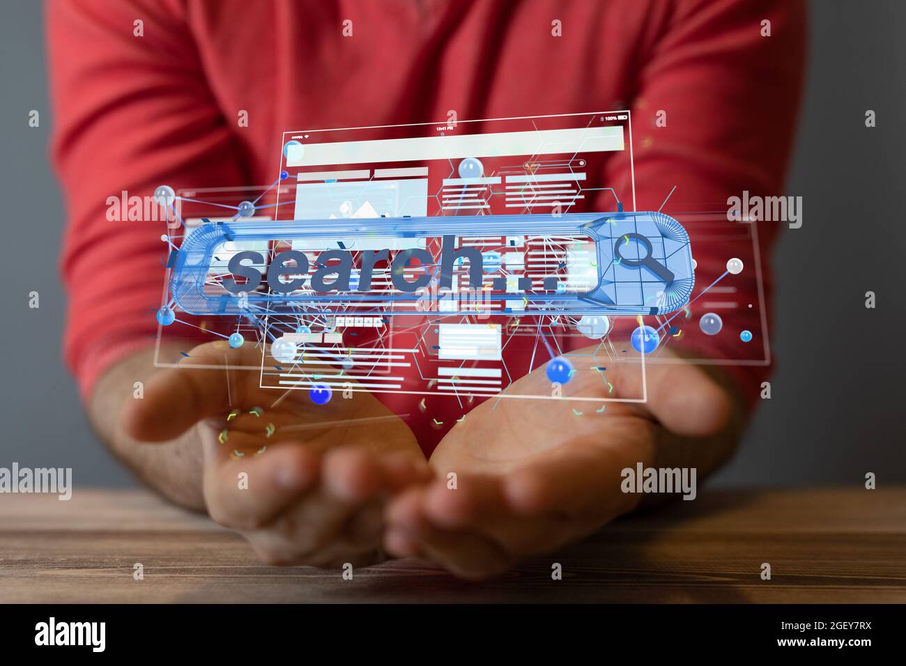 A digital concept of search engine optimization in hands Stock Photo