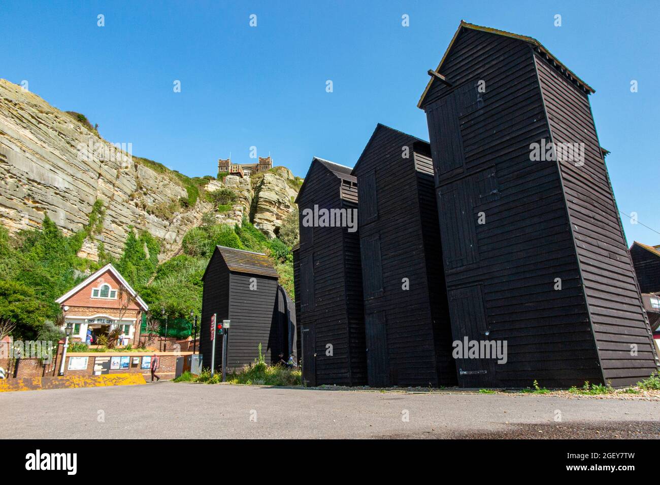 Victorian sail storage huts in Hastings Old Town with the funicular ...