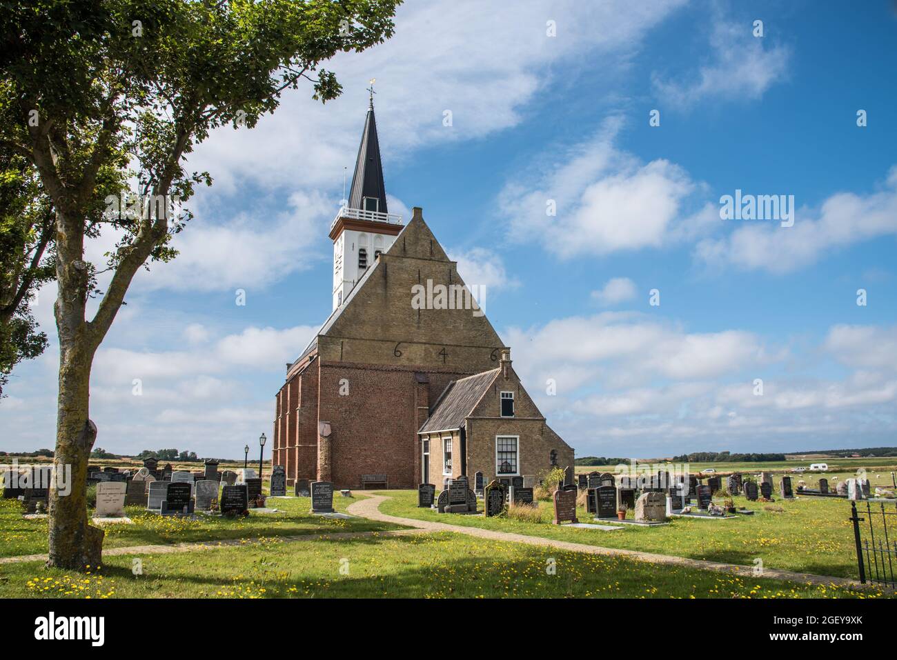 Texel, the Netherlands. August 2021. The old church with cemetery In Den Hoorn at the island of Texel, Holland.  Stock Photo