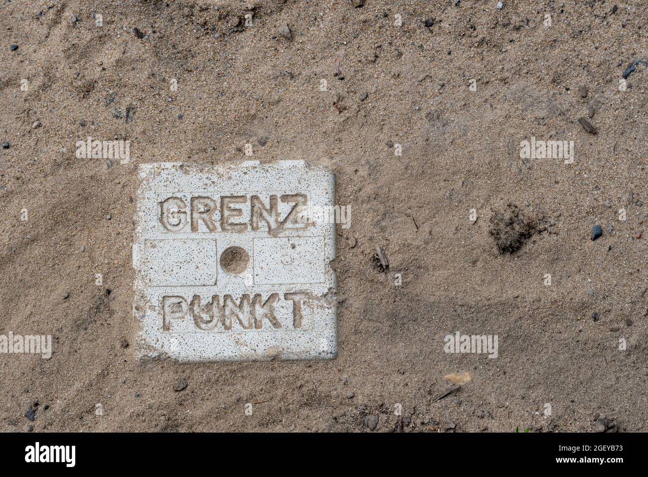 German boundary stone called Grenzpunkt. Stock Photo