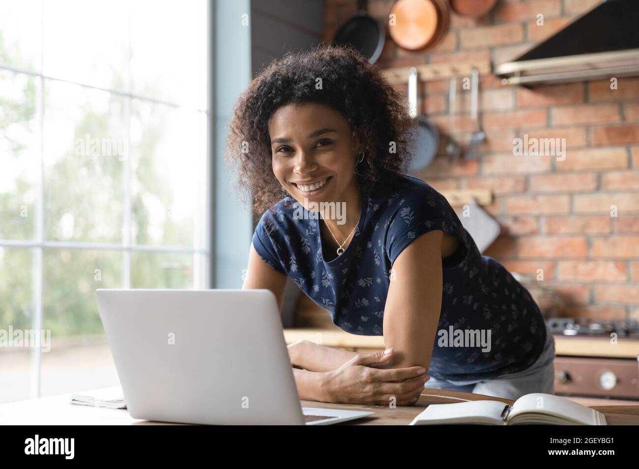 Happy African American student girl studying from home Stock Photo - Alamy