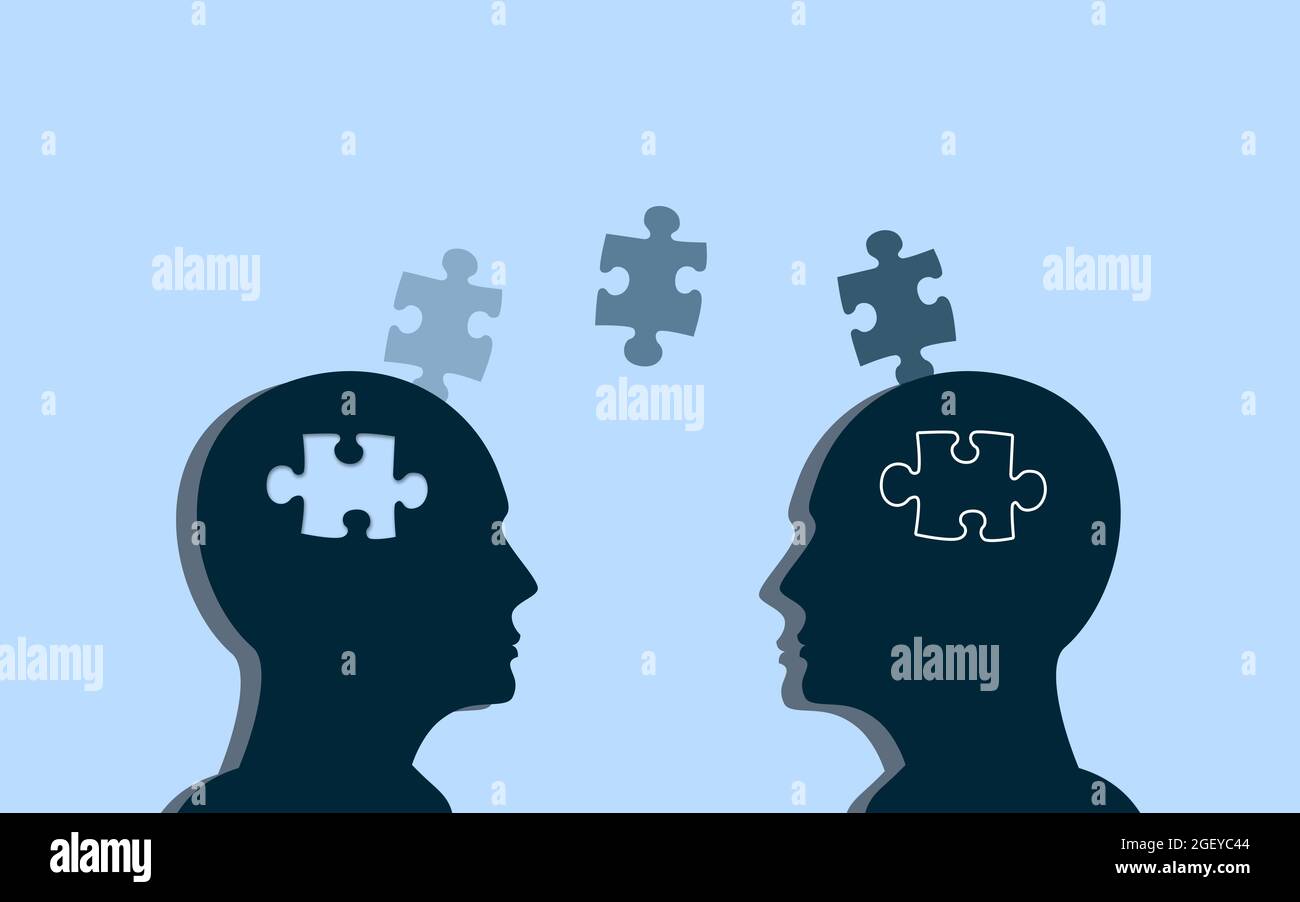Two Person Exchanging a piece of jigsaws puzzle. One Human head give the piece to another human brain. donor and receiver Concept creative idea. Stock Photo