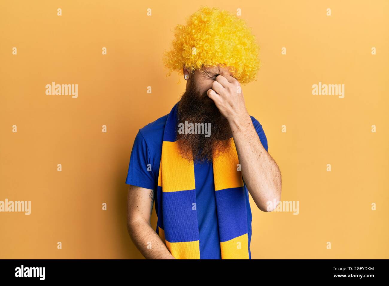 Redhead man with long beard football hooligan cheering game wearing ...