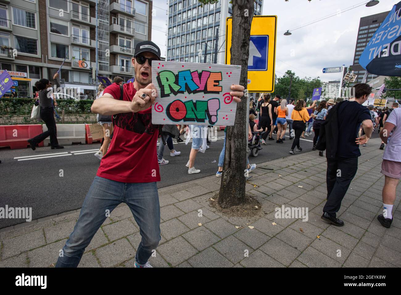 Rotterdam, Netherlands. 21st Aug, 2021. Centrum, Rotterdam, Netherlands. Saturday 21st August, 2021. Tens of thousands or protesters took to the streets in six major cities' of the Netherlands today. The demonstrators showed their disapproval regarding government measures or restrictions relating to the entertainment sector and, the Covid-19 pandemic; restrictions they consider to be of double standards. Demonstrations are demanding the events sector should open its doors to full capacity as of the 1st Credit: Charles M Vella/Alamy Live News Stock Photo