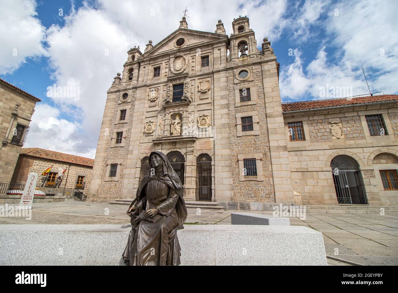 Avila, Spain - September 9, 2017: Image of Santa Teresa de Jesús in front of The church - convent of Santa Teresa. Building built in the birthplace, d Stock Photo