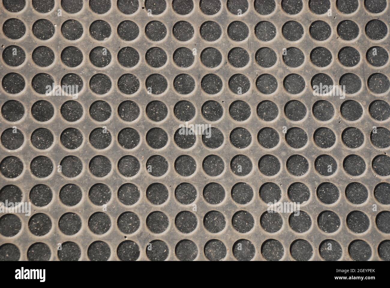 Rubber flooring with holes Stock Photo Alamy