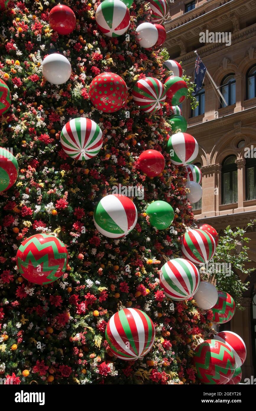 Sydney Australia, close up of Christmas tree decorations in Martin Place with sandstone building in background Stock Photo