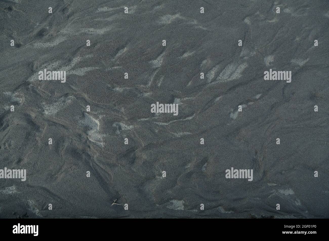 Fine black earth texture with various shapes and elements Stock Photo