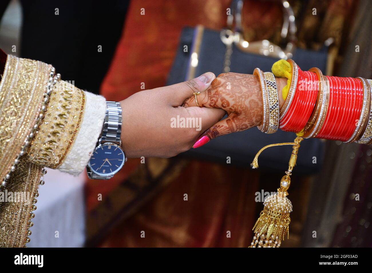 Groom Holding Bride Hand. Closeup Shot. Indian Wedding. Stock Photo