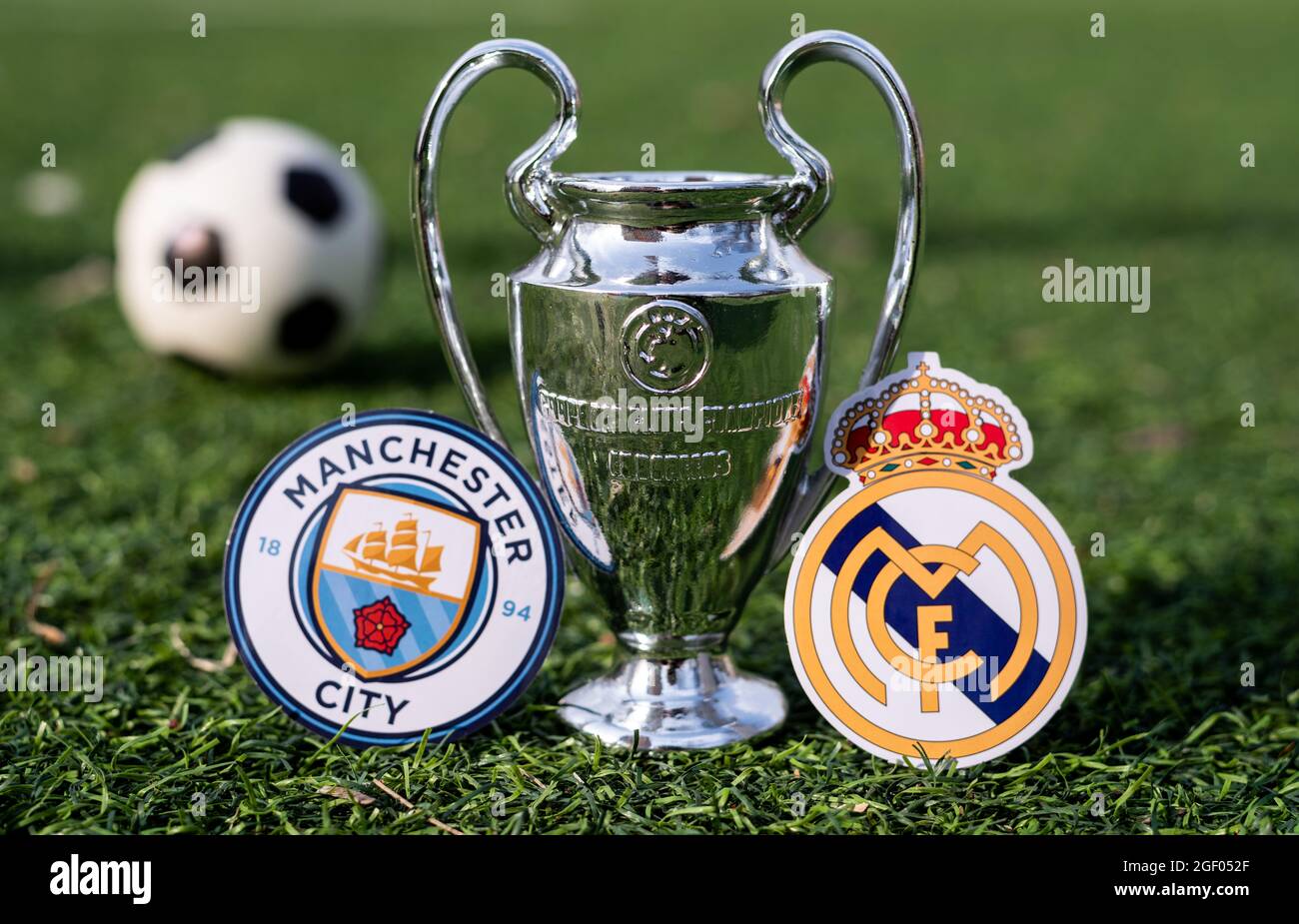 April 16 21 Moscow Russia The Uefa Champions League Cup And The Emblems Of The Football Clubs Manchester City F C And Real Madrid Cf On The Gre Stock Photo Alamy