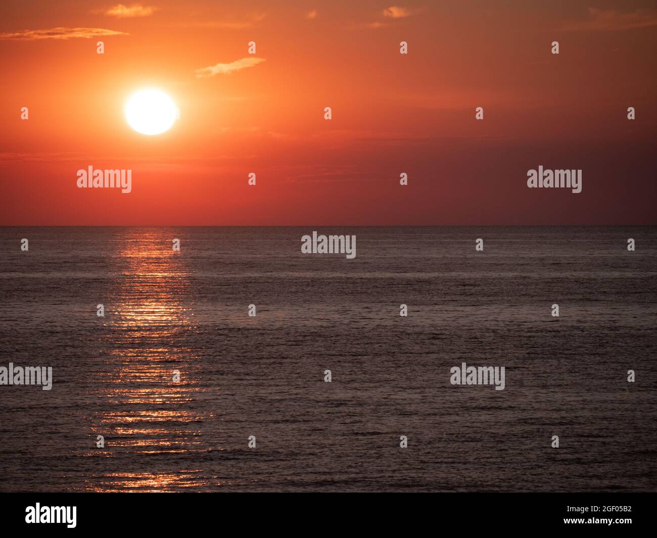 A beautiful shot of the red sunset above the sea Stock Photo - Alamy