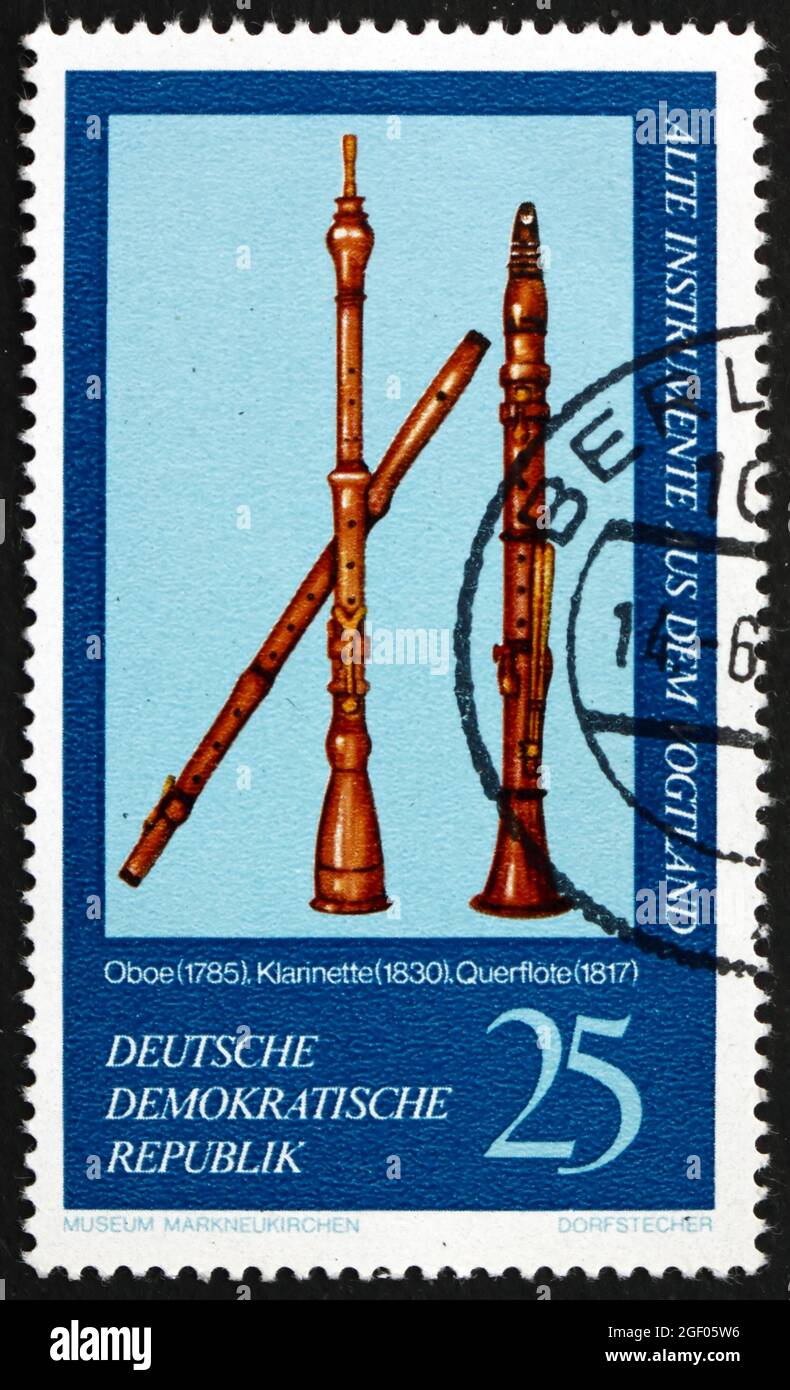 GERMANY - CIRCA 1977: a stamp printed in Germany shows Oboe, 1785, Clarinet, 1830 and Flute, 1817, Vogtland Musical Instruments from Markneukirchen Mu Stock Photo