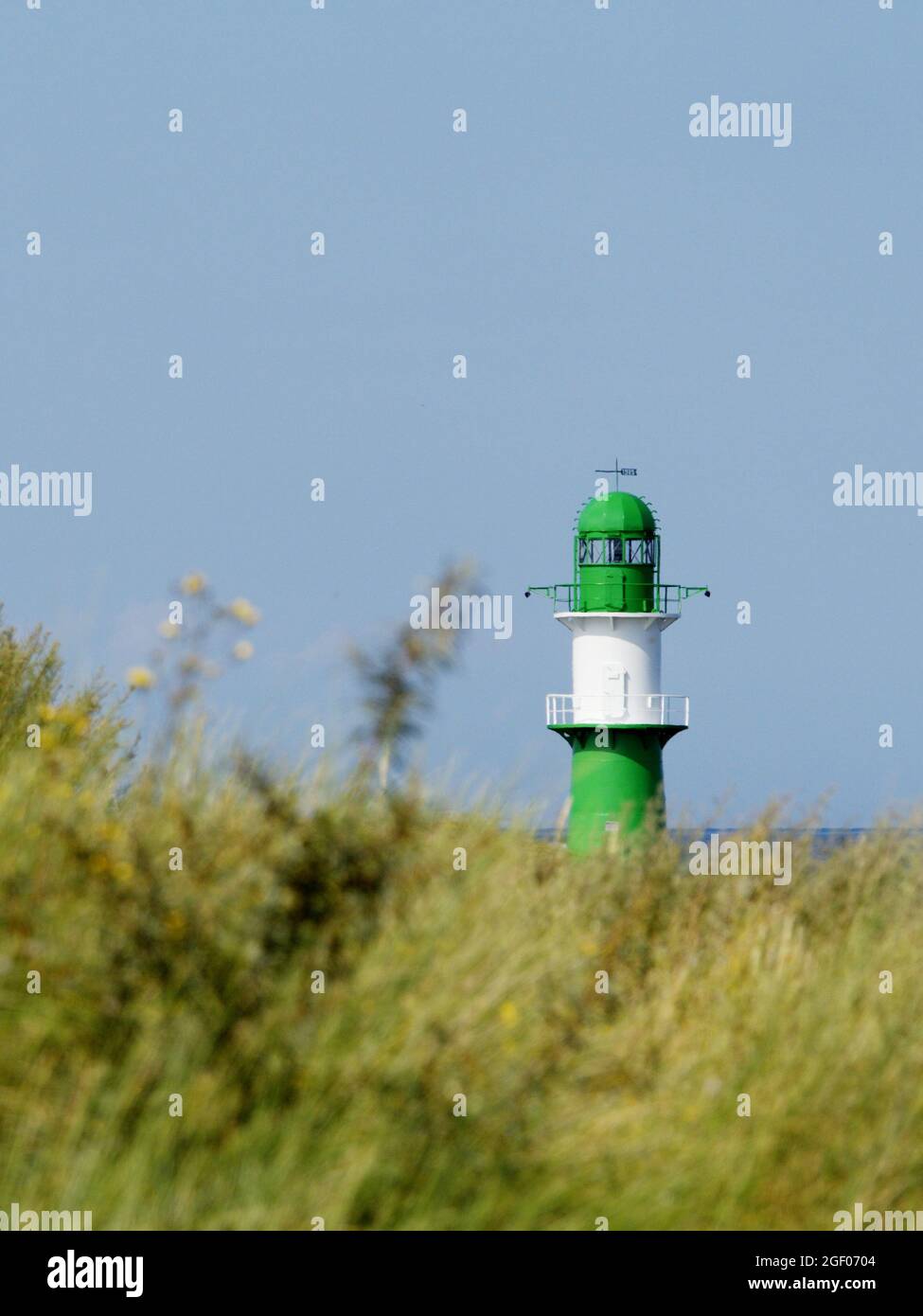 Green lighthouse in Warnemünde Stock Photo