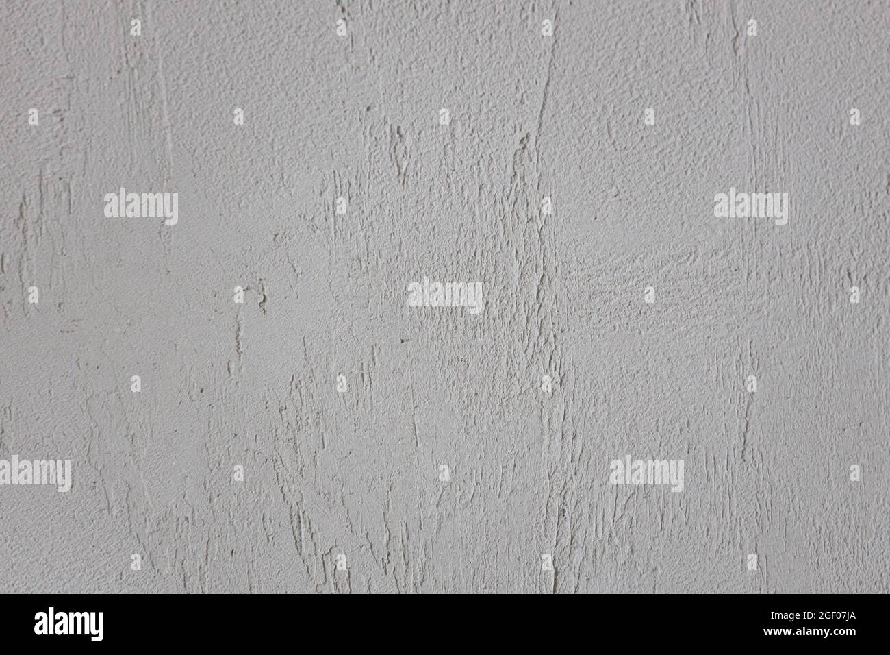 Empty gray surface. Abstract background. Wall with plaster. Back for announcement Stock Photo