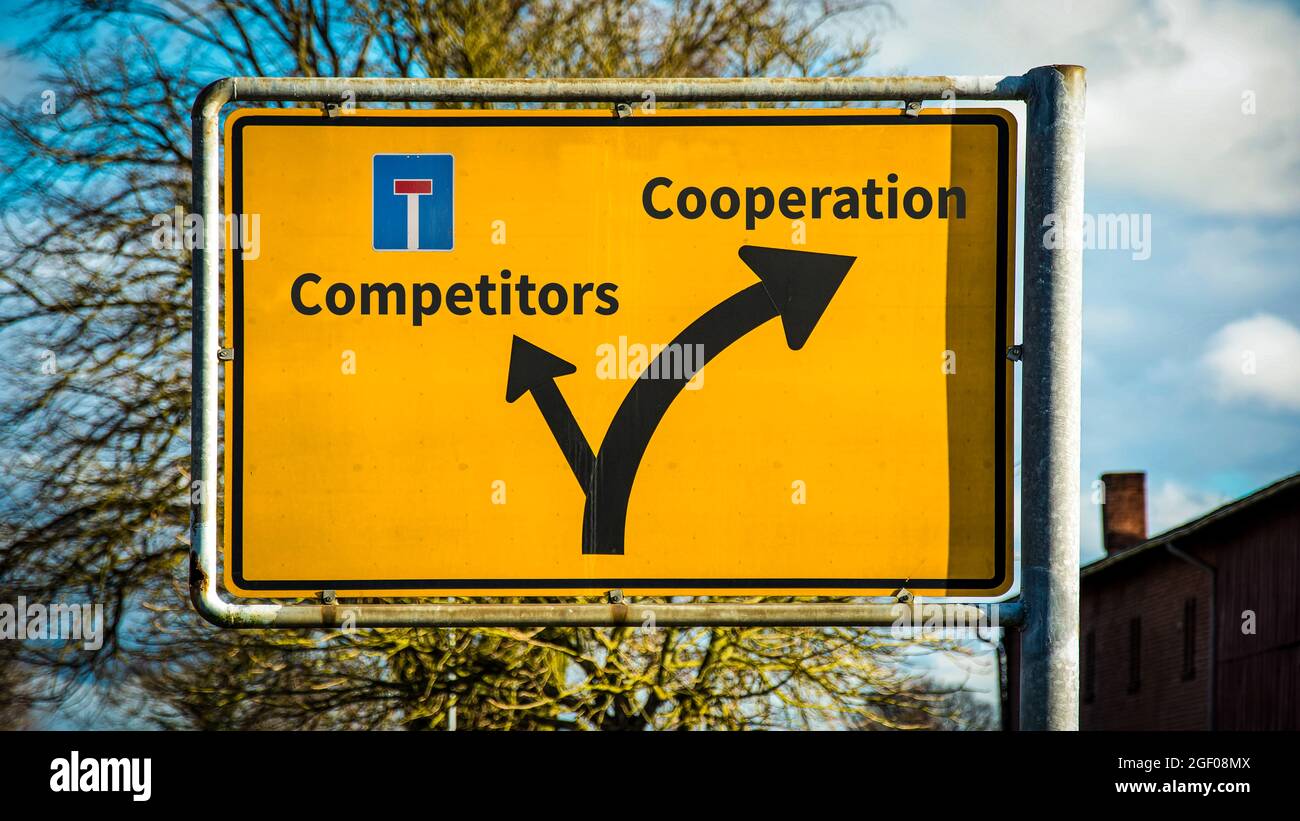 Competitors Sign Street Sign the Direction Way to Cooperation versus Competitors Stock ...