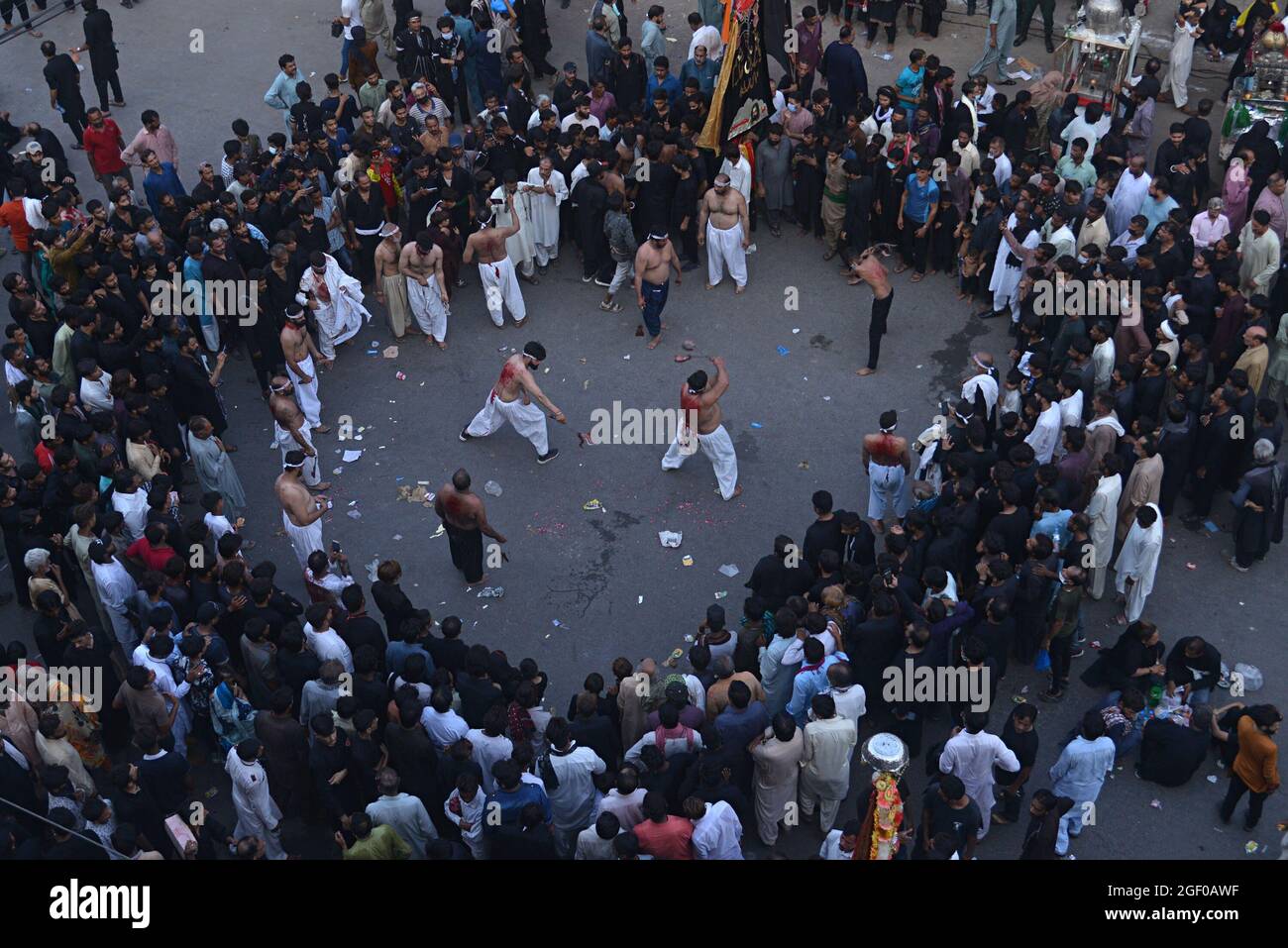 (8/19/2021) Pakistani Shiite Muslim take a part in a procession to mark ...