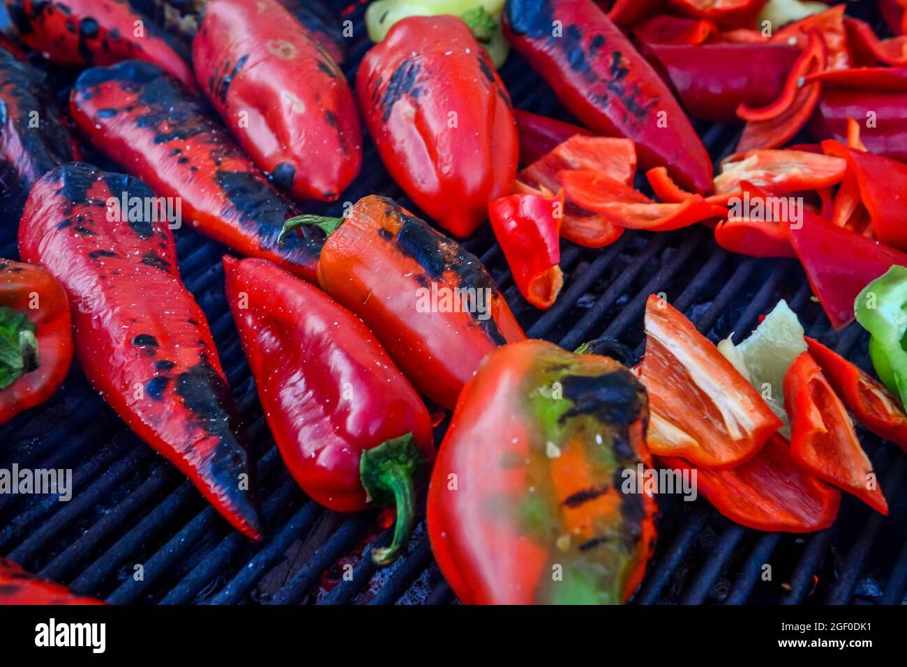 A closeup of the red peppers being grilled on the grill Stock Photo - Alamy